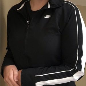 Black and white zip up Nike track jacket